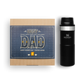 Black Stanley travel mug with a 'Best Dad' gift box on a white background
