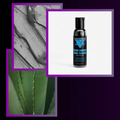 Banshee Organic Charcoal Facial Cleanser bottle with aloe vera plant and close-up of skin texture on a purple background.
