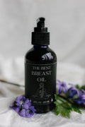Organic breast massage oil bottle by Velvet Bloom Beauty & Wellness — lymphatic drainage and self-care ritual oil"