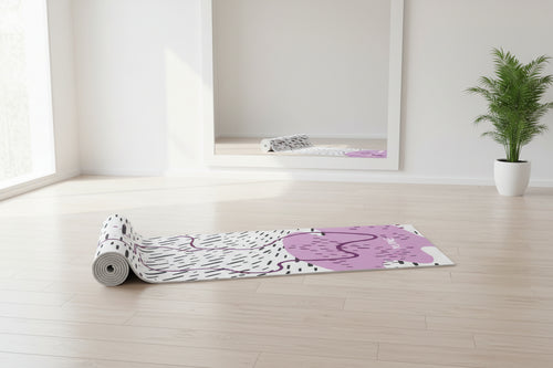 Yoga mat with abstract design and 'YUNI' branding on a white background