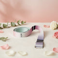Gradient yoga strap with a logo on a white background